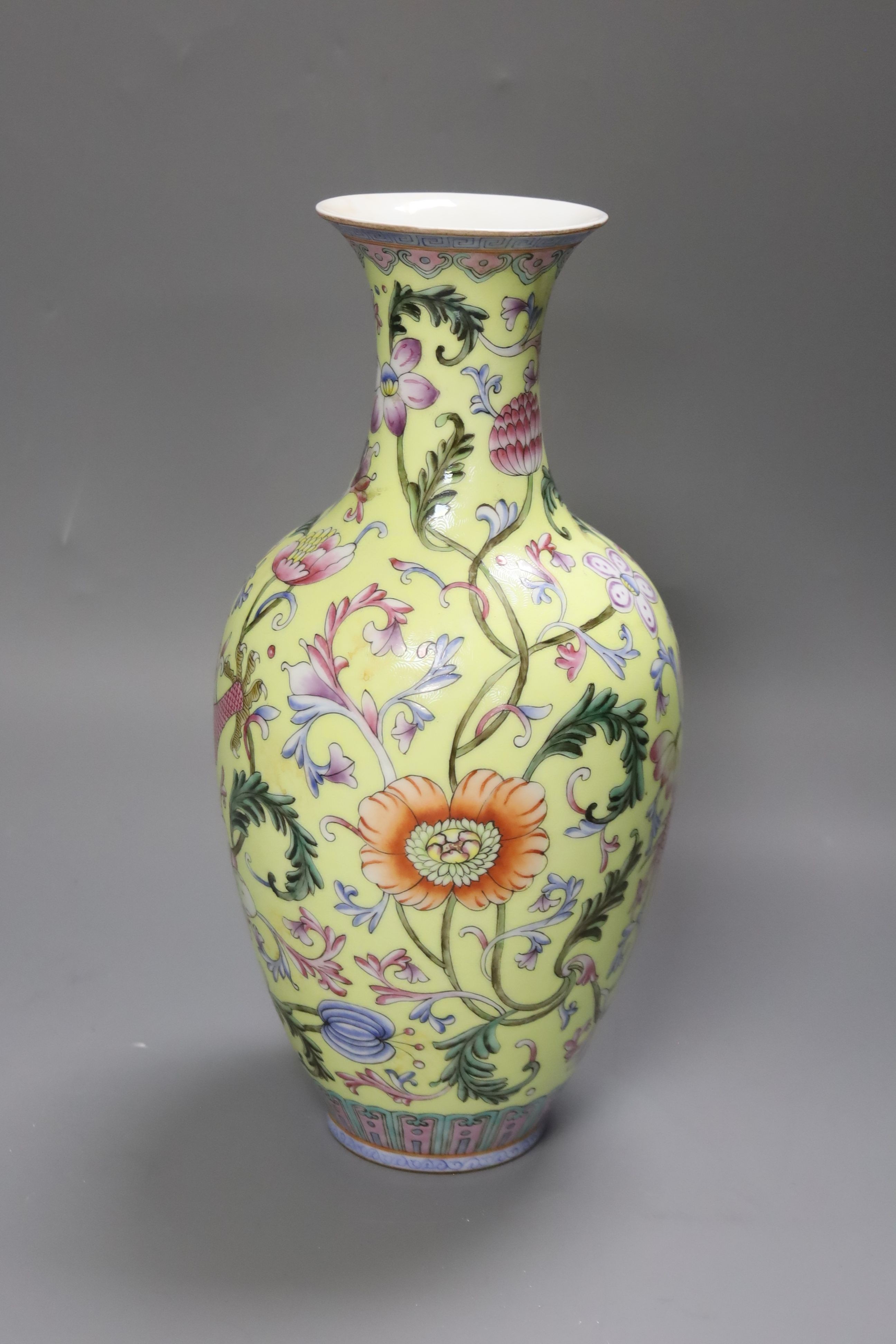 A Chinese porcelain yellow sgraffito ground ‘dragon’ vase, Qianlong seal mark, Republic period, 30cm